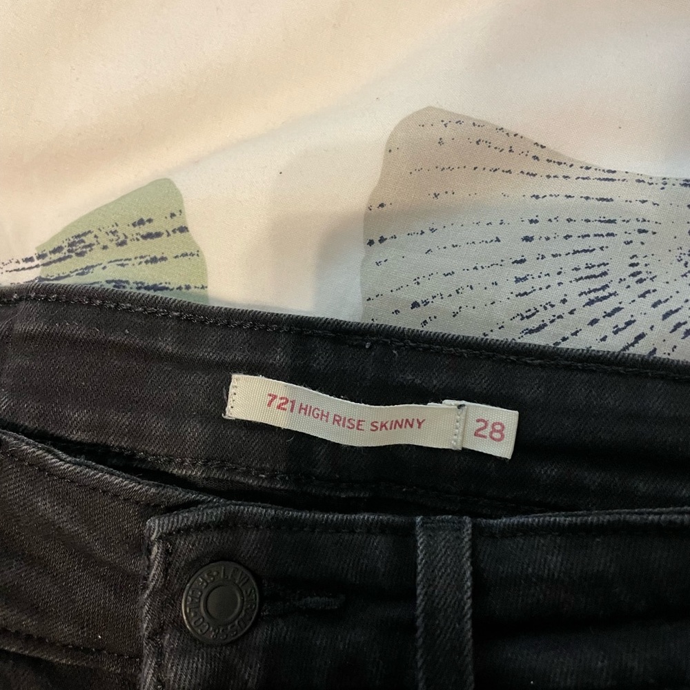 721 high rise skinny black jeans